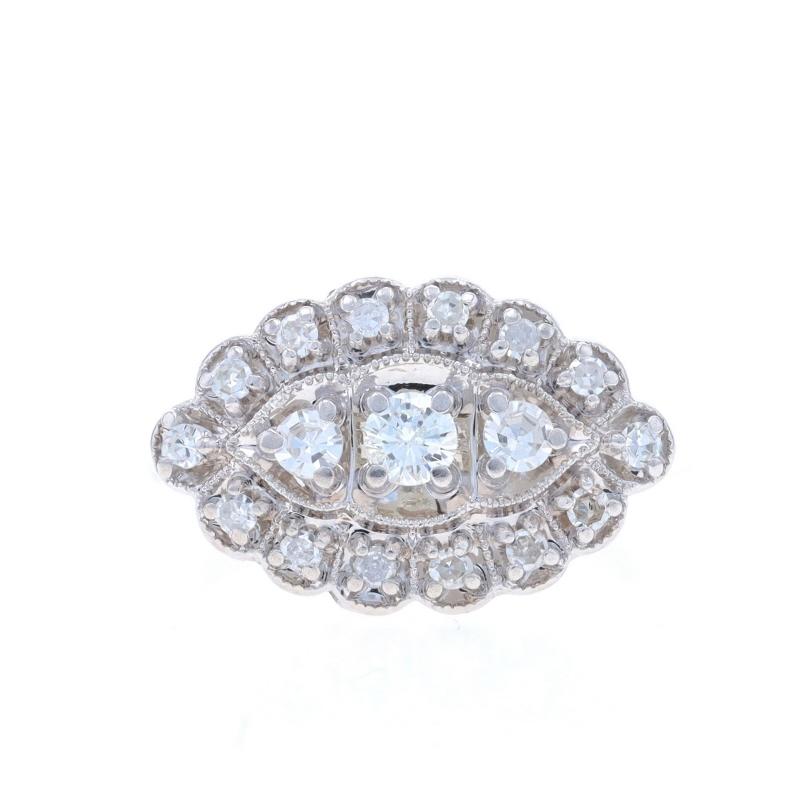 Size: 6 1/4
Sizing Fee: Up 2 1/2 sizes for $35 or Down 1 1/2 sizes for $35

Era: Vintage

Metal Content: 14k White Gold

Stone Information

Natural Diamond
Carat(s): .15ct
Cut: Round Brilliant
Color: J
Clarity: SI2
Stone Note: (center