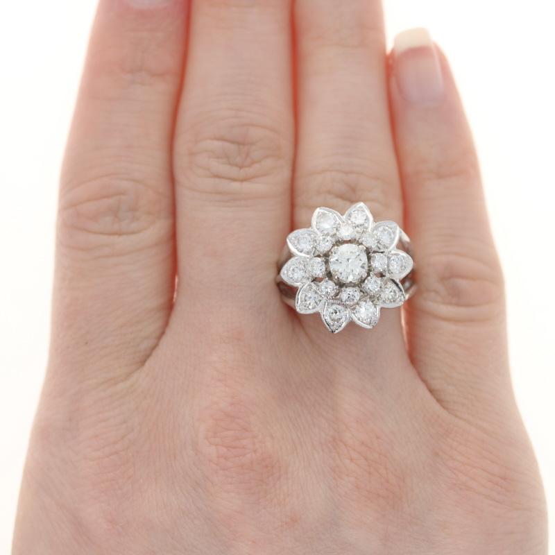 Size: 6
Sizing Fee: Down 2 for $30 or up 2 for $35

Era: Vintage

Metal Content: 14k White Gold

Stone Information

Natural Diamond
Carat(s): .55ct
Cut: Round Brilliant
Color: K
Clarity: VS2
Stone Note: (center stone)

Natural Diamonds
Carat(s):