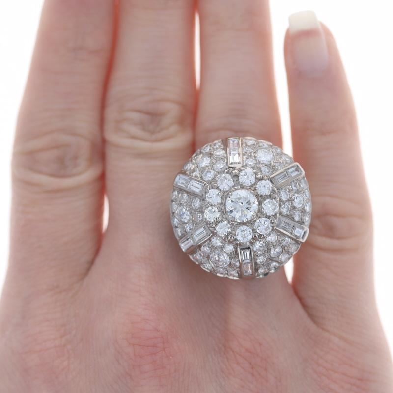 Size: 9

Era: Vintage

Metal Content: 14k White Gold

Stone Information
Natural Diamond
Carat(s): .78ct
Cut: Round Brilliant
Color: K
Clarity: VS2

Natural Diamonds
Carat(s): 3.23ctw
Cut: European, Single, & Round Brilliant
Color: H - I
Clarity: VS1
