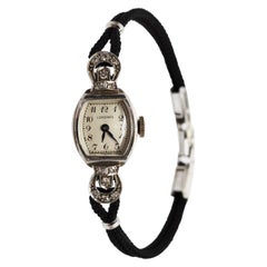 Montre-bracelet Longines Vintage en or blanc avec diamants pour femmes