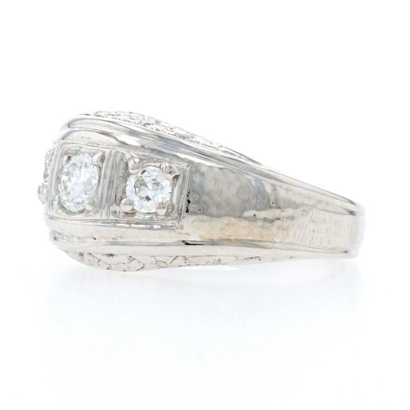 Size: 7 1/4
Sizing Fee: Up or Down 2 sizes for $30

Era: Vintage

Metal Content: 14k White Gold

Stone Information: 
Natural Diamonds
Total Carats:.50ctw
Cut: Round Brilliant 
Color: G - H
Clarity: VS2 - SI1

Style: Three-Stone 
Features: Etched