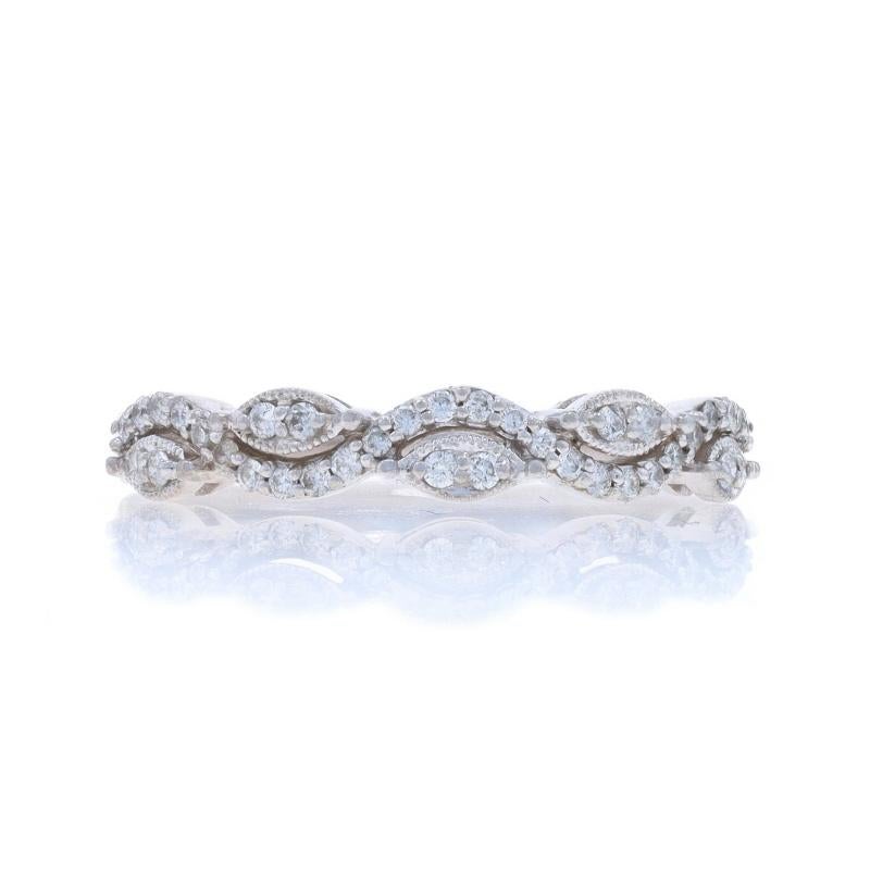 Size: 7
Sizing Fee: Up 2 sizes for $40 or Down 1 size for $40

Metal Content: 14k White Gold

Stone Information

Natural Diamonds
Carat(s): .25ctw
Cut: Round Brilliant
Color: G - H
Clarity: SI1 - SI2

Total Carats: .25ctw

Style: Band
Theme: Wavy