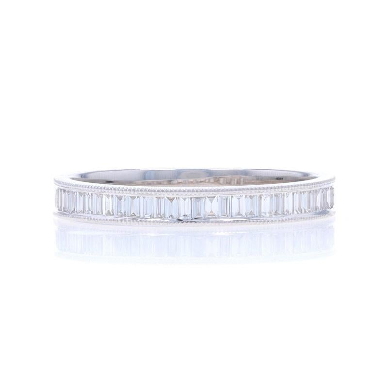 Size: 6 1/2

Metal Content: 14k White Gold

Stone Information

Natural Diamonds
Carat(s): .23ctw
Cut: Baguette
Color: F - G
Clarity: VS2 - SI1

Total Carats: .23ctw

Style: Wedding Band with Diamonds
Features: Milgrain Detailing

Measurements

Face