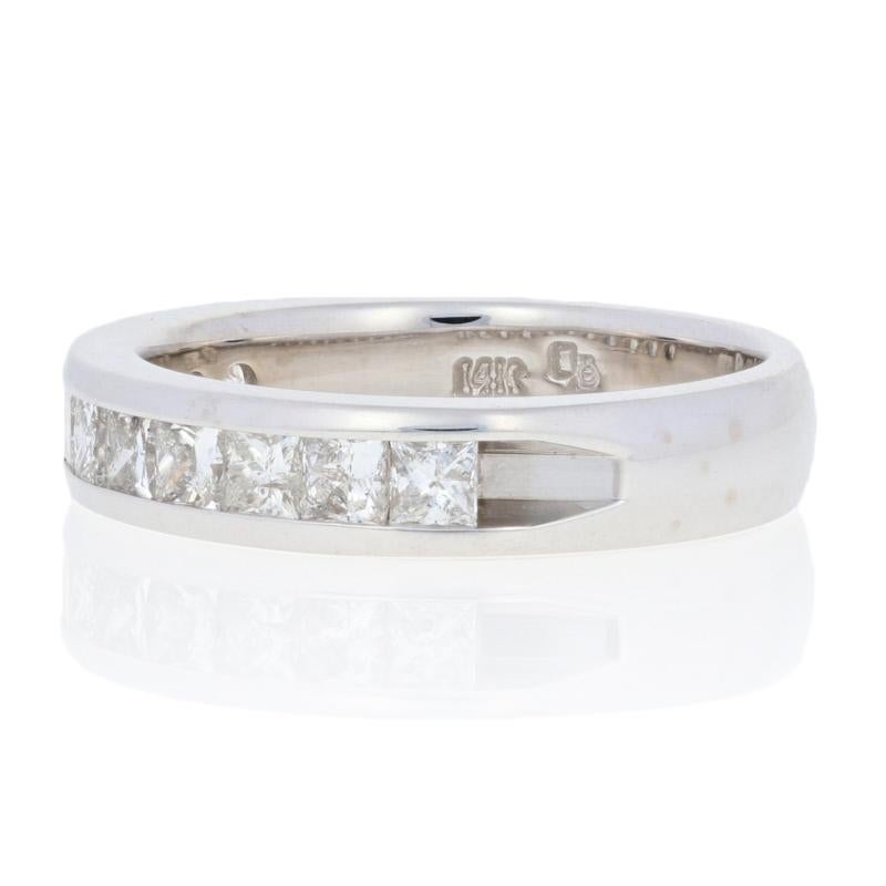 This ring is a size 7.

Metal Content: Guaranteed 14k Gold as stamped

Stone Information: 
Natural Diamonds  
Clarity: SI2 - I1 
Color: G - H   
Cut: Princess
Total Carats: 1.10ctw

Style: Wedding Band with Diamonds
Face Height (north to south):