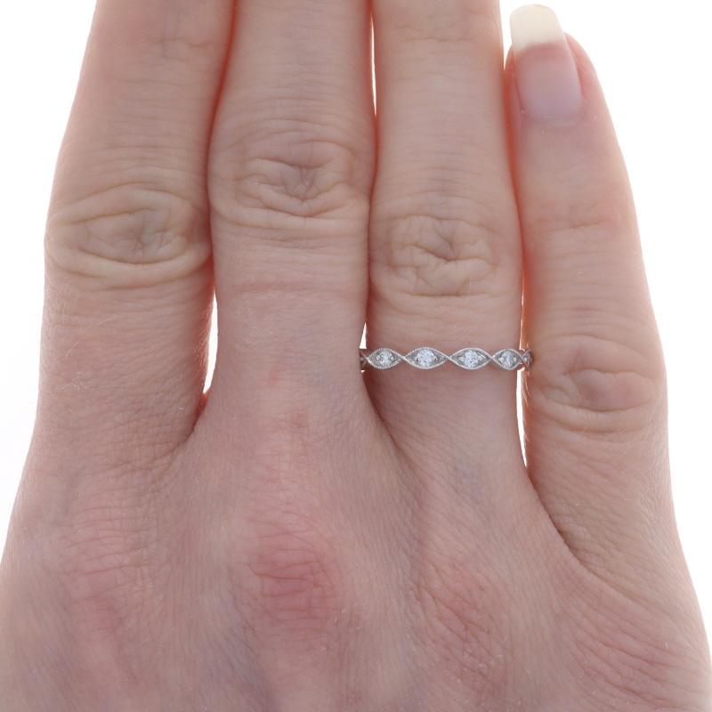 Size: 6 1/2
Sizing Fee: Up 2 sizes for $30 or Down 1 size for $30

Metal Content: 14k White Gold

Stone Information
Natural Diamonds
Carat(s): .22ctw
Cut: Round Brilliant
Color: G
Clarity: SI1

Total Carats: .22ctw

Style: Wedding Band with