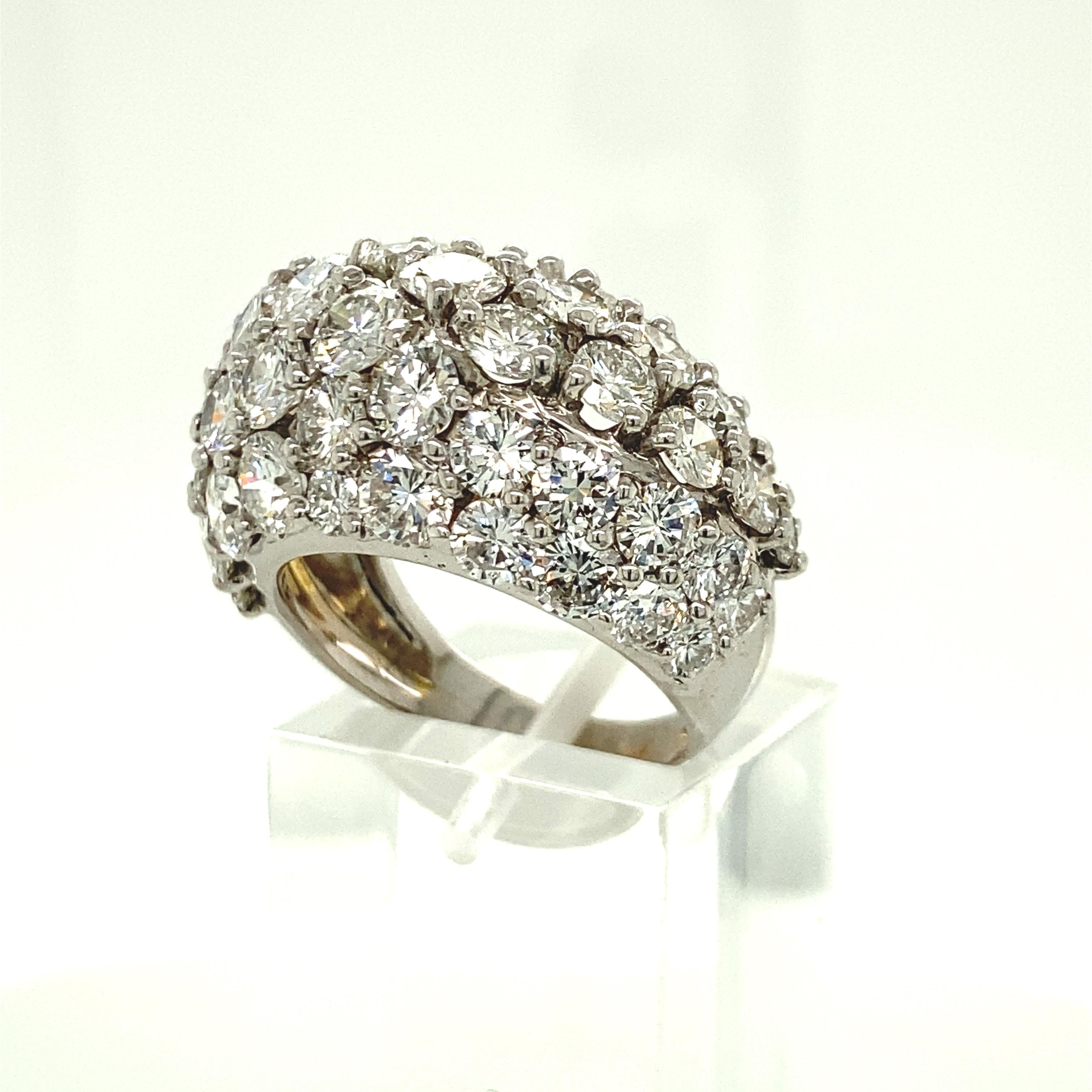 With this White Gold and 6.5 Karat Dome Diamond Ring your ring will dazzle and sparkle in even the lowest lighting. This ring is the perfect way to wear diamonds all day, currently sized to a 7 this ring is a perfect way to share your love this