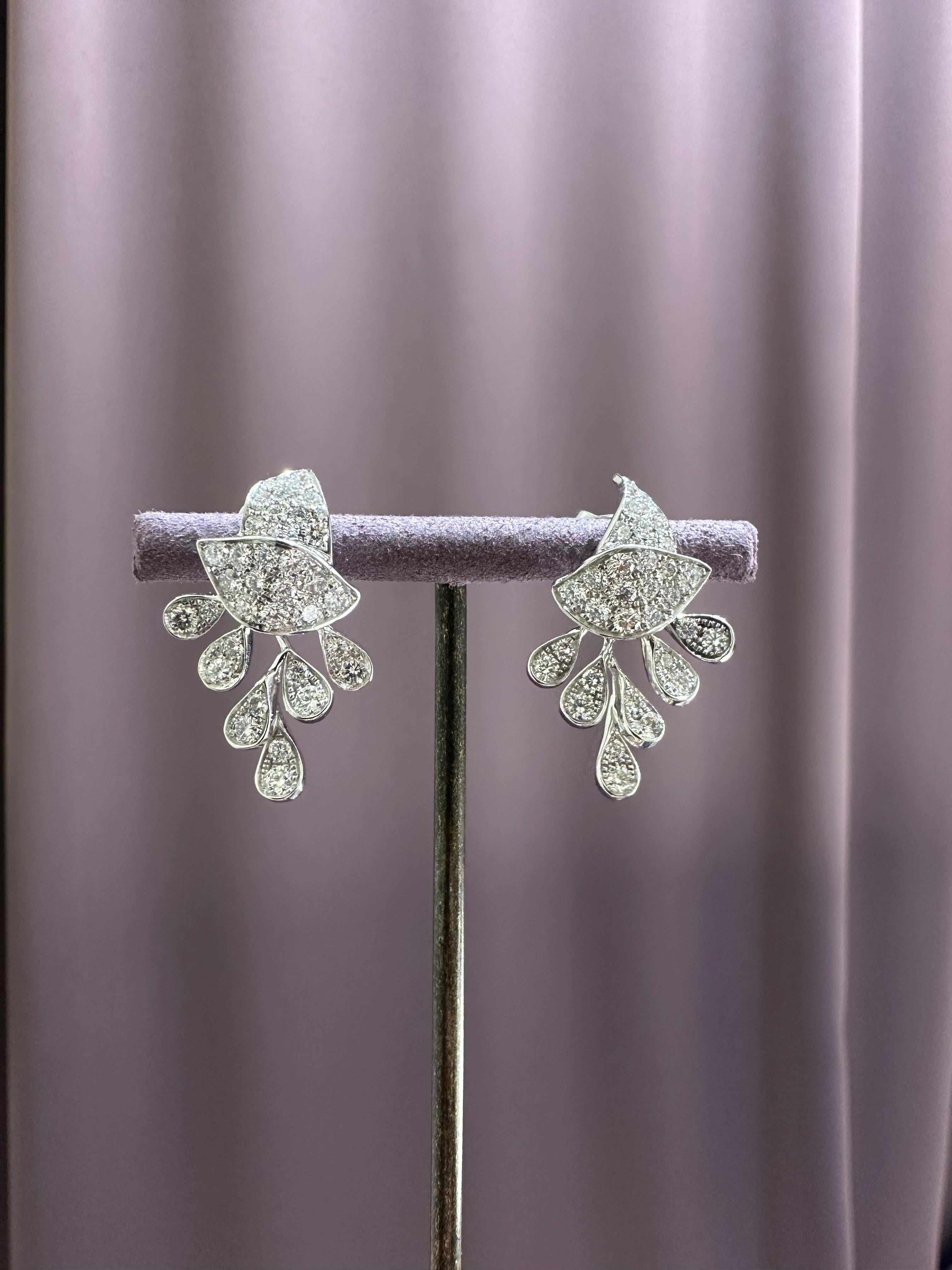Contemporary White Gold Drop Earrings set with Diamonds For Sale