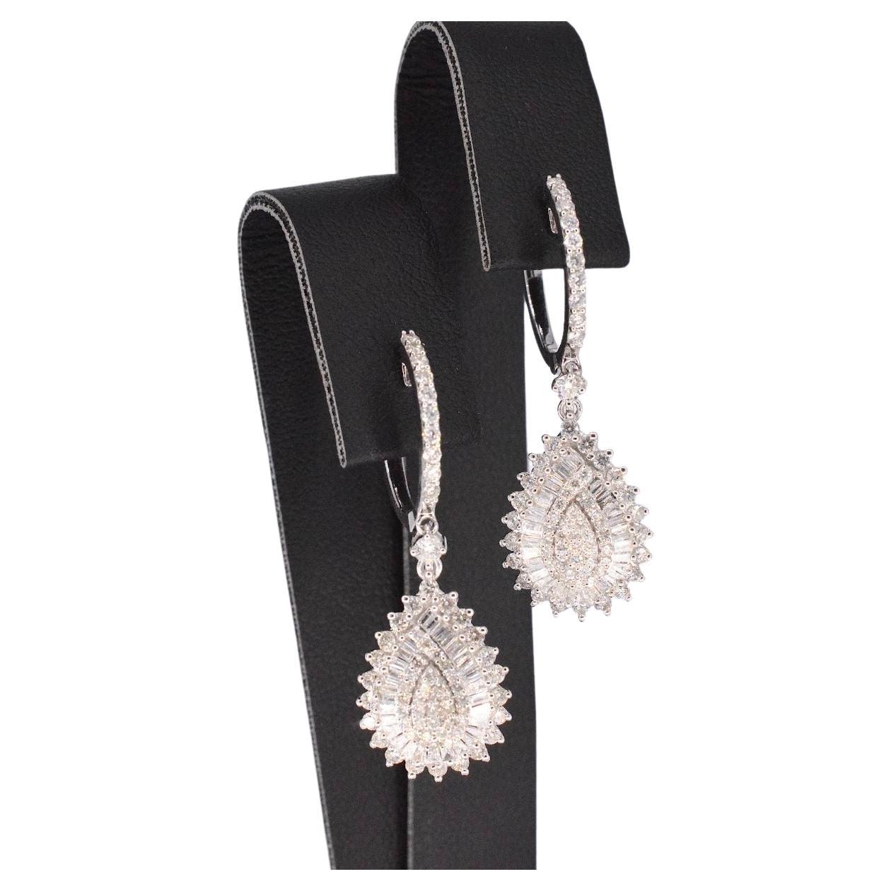 White gold drop-shaped earrings with diamonds For Sale