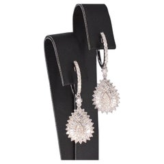 White gold drop-shaped earrings with diamonds
