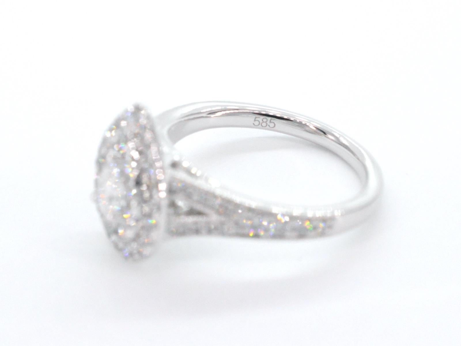 White Gold Drop-Shaped Entourage Ring with Diamonds For Sale 1