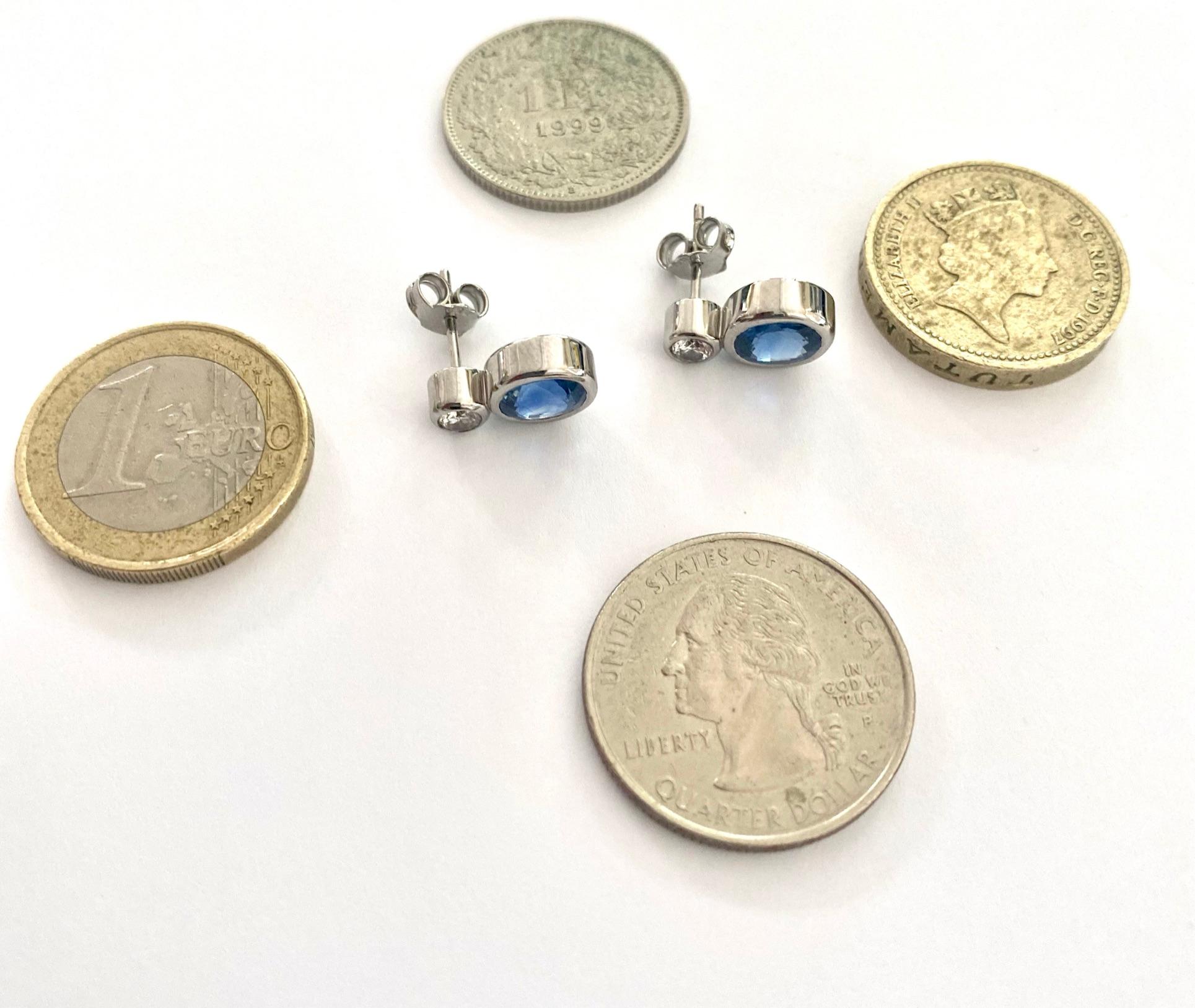 White Gold Ear Studs Each with a Sapphire and Brilliant 1