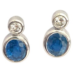 White Gold Ear Studs Each with a Sapphire and Brilliant