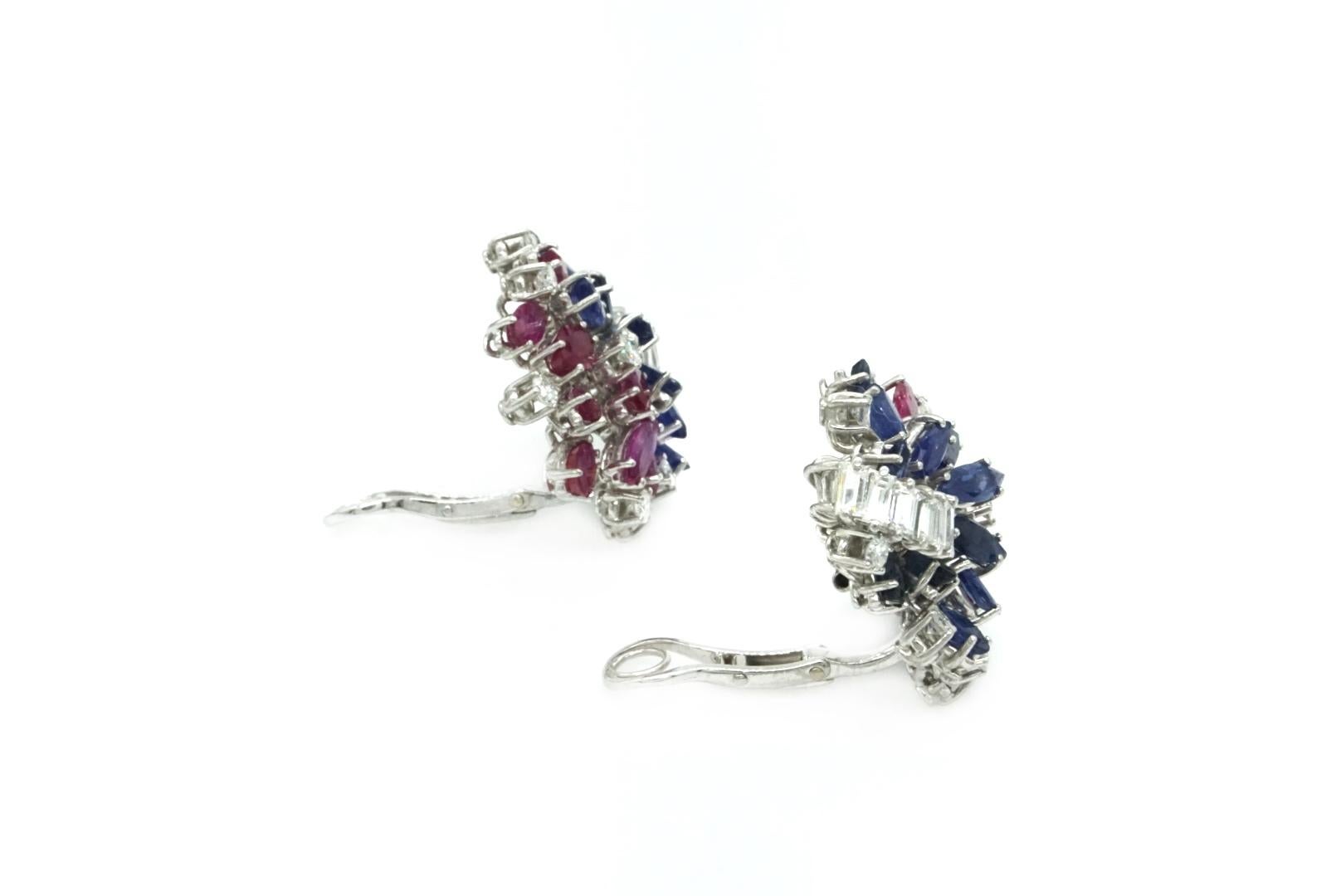 A Pair of 1950s Earclips in white gold with diamonds, sapphires and rubies mounted on 18k white gold. 