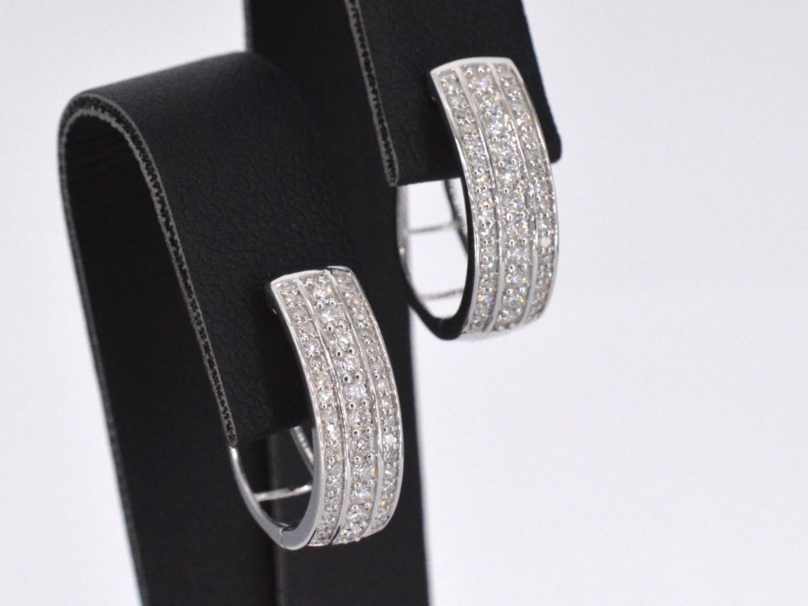 Women's White Gold Earrings with a Brilliant Cut Diamond For Sale