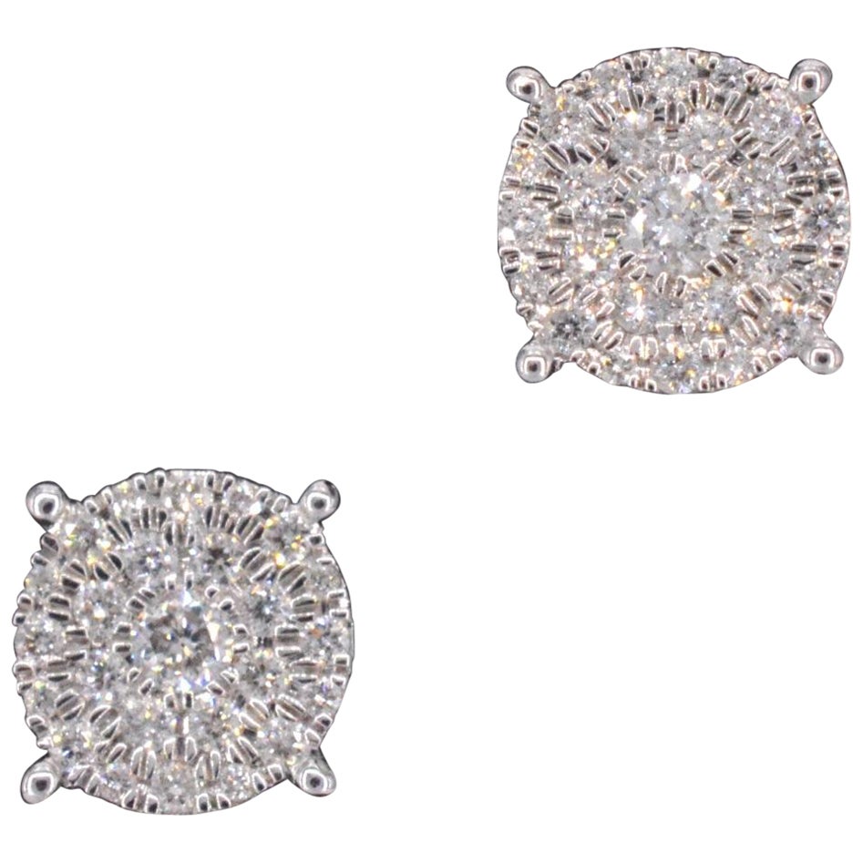 Boucles d'oreilles en or blanc avec un diamant taille brillant