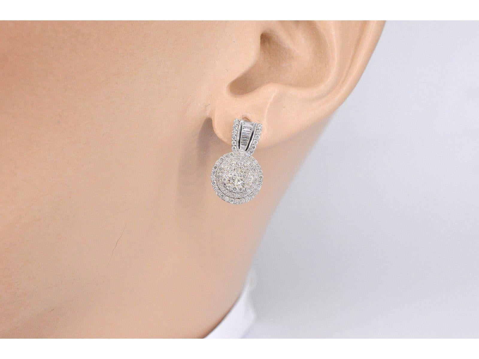 

Diamonds
Weight: 1.00 carat
Cut: Brilliant, princess, baguette and round cut
Colour: F-G
Clarity: SI-P
Quality: Very good

Jewel: Earrings
Weight: 3.8 gram
Hallmark: 14 karat 
Measurement: 17 mm
Condition: New

Retail value: € 3.000

