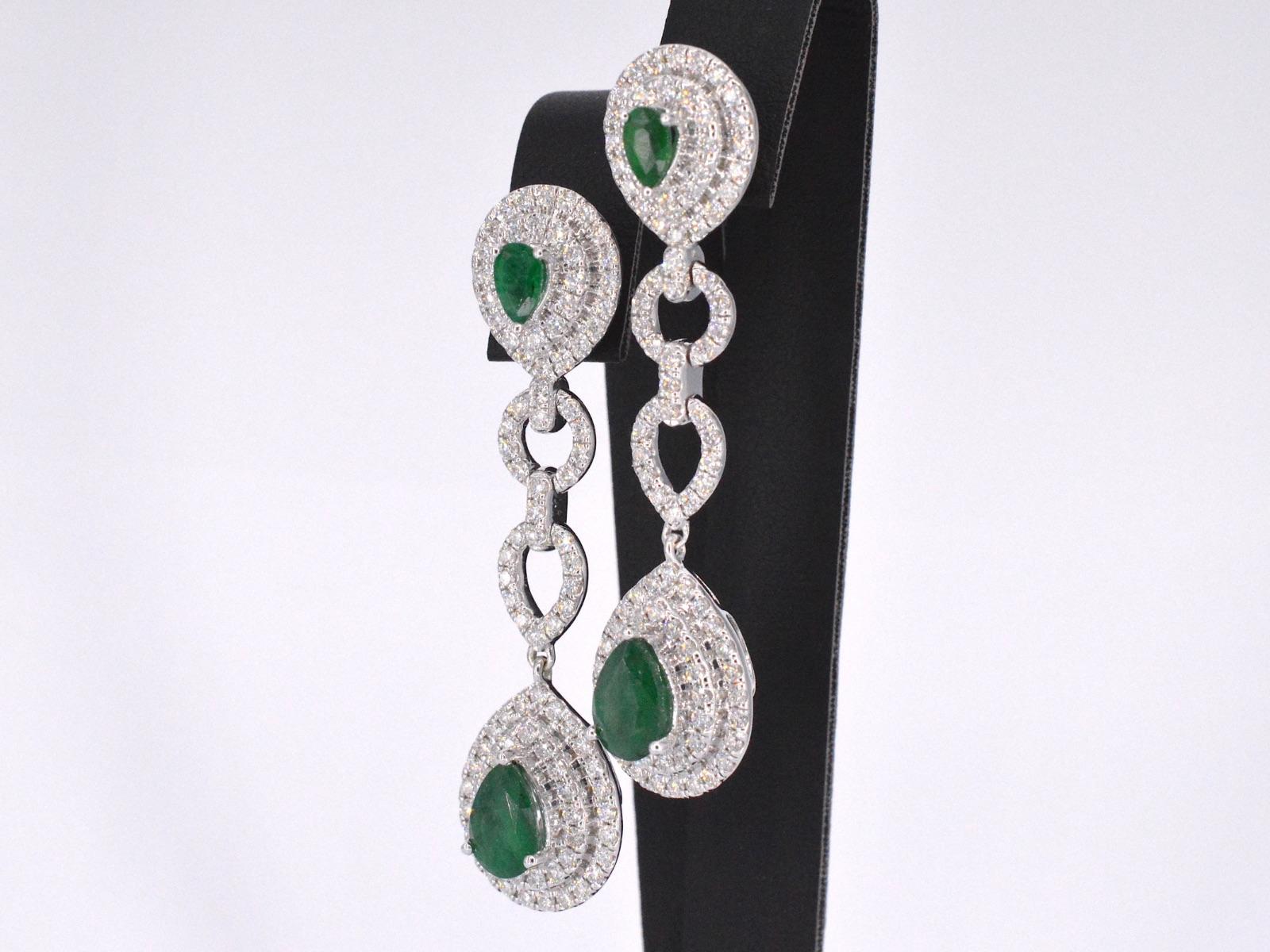 Contemporary White gold earrings with diamonds and emeralds