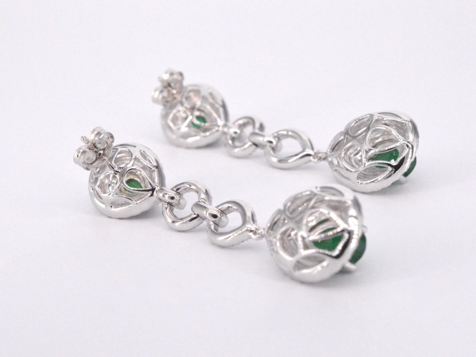 Women's White gold earrings with diamonds and emeralds