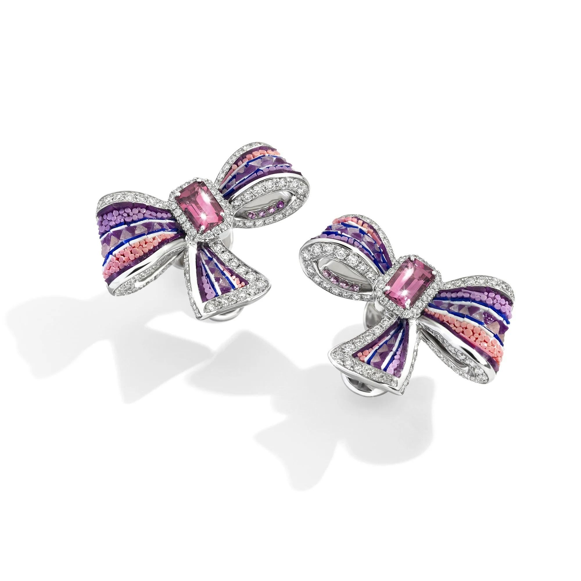 Suspended between dream and reality, Pink Ribbon earrings embody the essence of elegance. 
Crafted in white gold and adorned with micromosaic, they sing an ode to artistic detail, embellished with radiant diamonds, pink sapphires, and tourmalines.