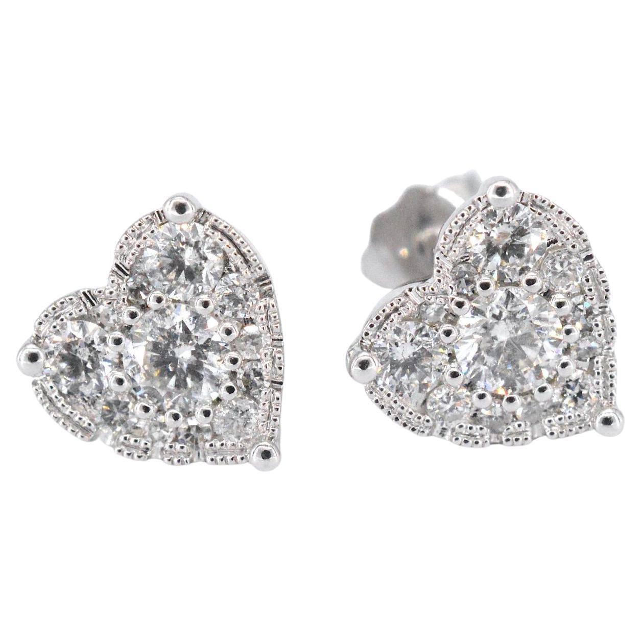 Boucles d'oreilles en or blanc avec diamants en forme de cœur en vente