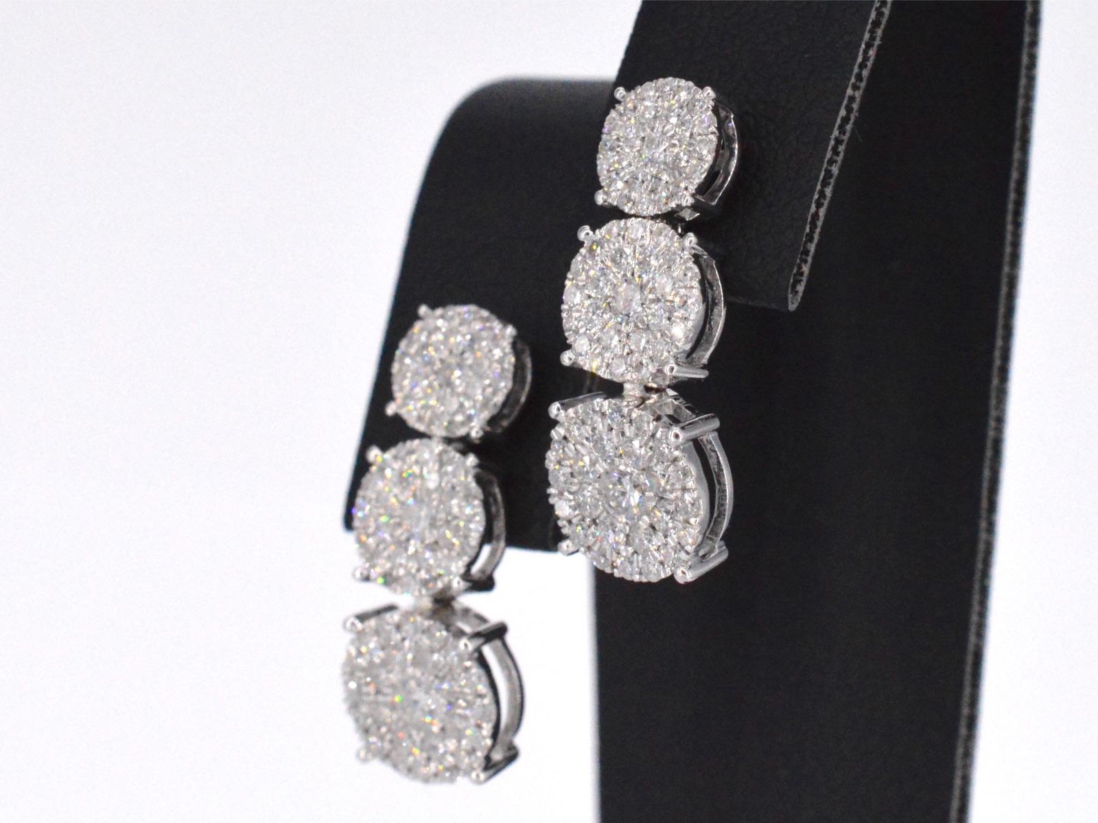 Brilliant Cut White Gold Earrings with Three Chatons of Diamonds below Each Other For Sale