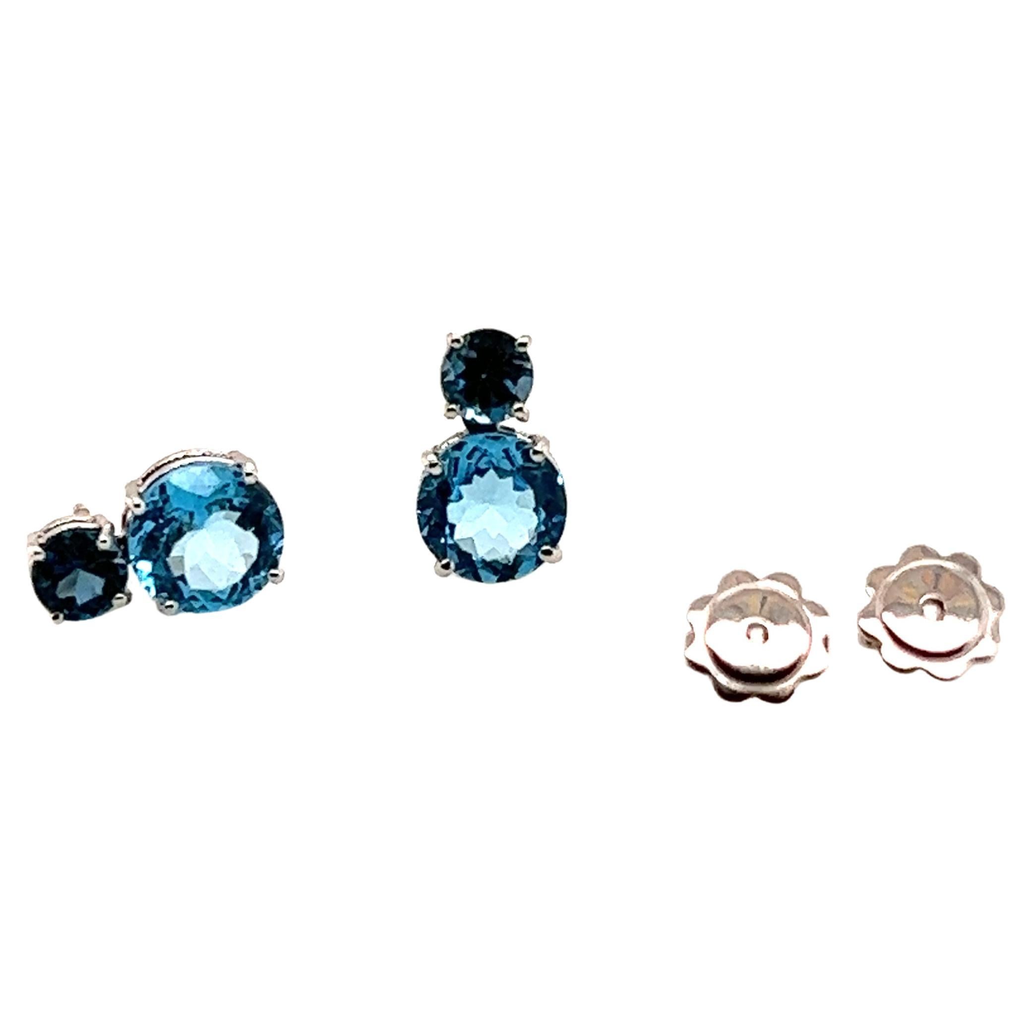White Gold Earrings With Topaz and London Topaz
French Collection by Mesure et Art du Temps. 

18 Carat white gold earrings surmounted by a topaz and a London topaz. The earring measures 1.3 cm in length and 1.4 cm in width. The weight of the gold