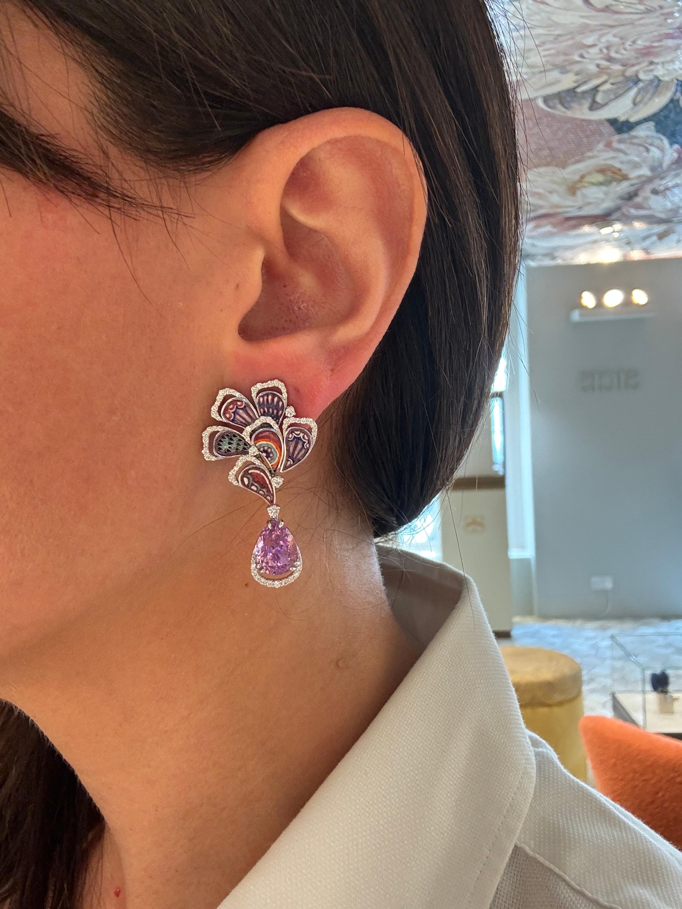 Introducing the magical Dewdrop Flamingo earrings, a pair of earrings that are a testament to luxury with its vibrant purple mosaic patterns. Each teardrop shape is meticulously crafted, boasting one-of-a-kind design and embellished with a graceful