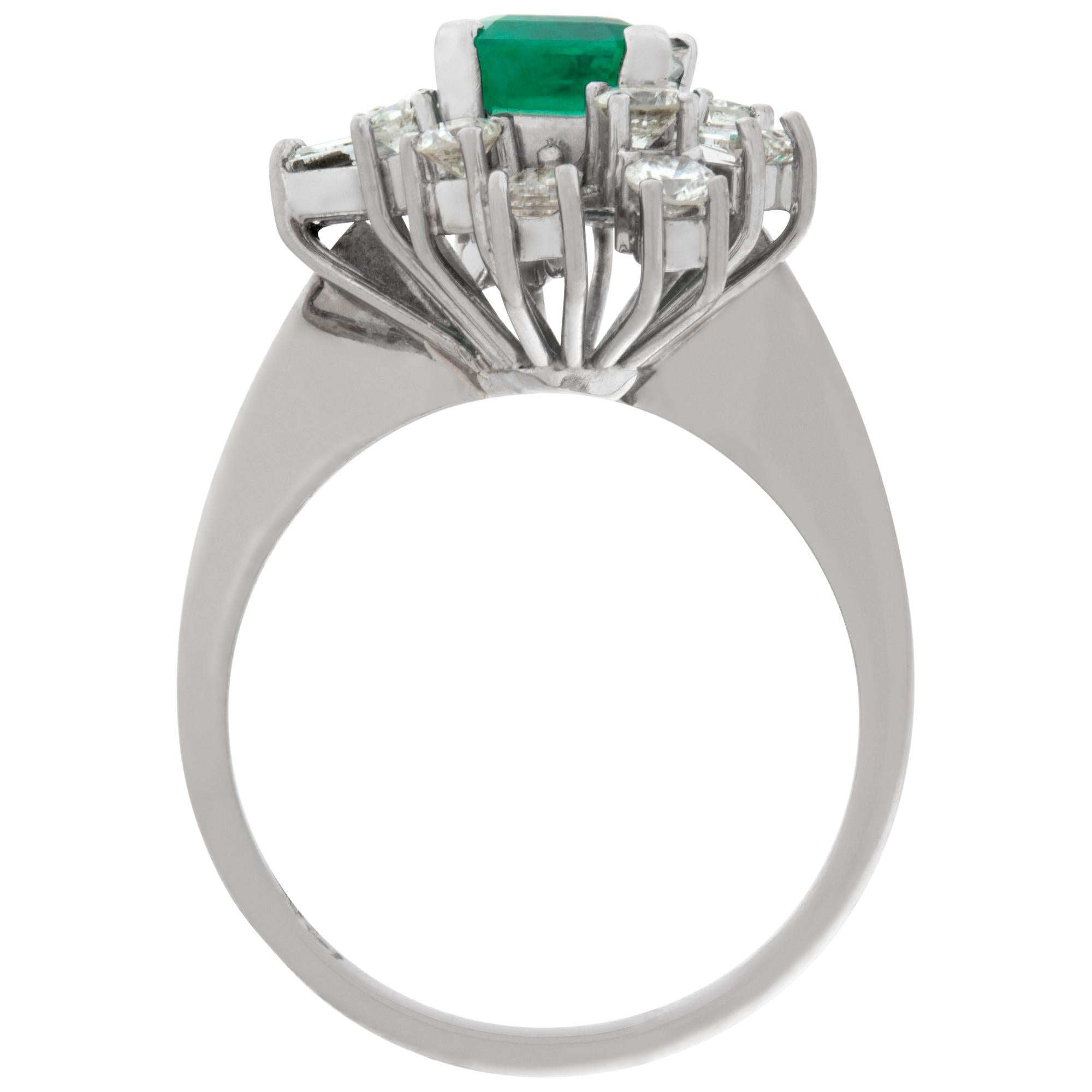 Women's White gold emerald and diamond cocktail ring For Sale