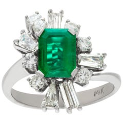 White gold emerald and diamond cocktail ring