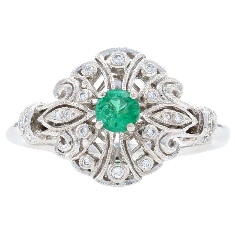 White Gold Emerald and Diamond Ring, 14 Karat Round Cut .22 Carat Milgrain