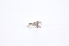 White Gold Emerald Cut Diamond Engagement Ring with a Halo