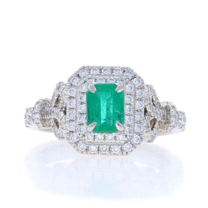 Size: 4 3/4
Sizing Fee: Up 2 sizes for $80 or Down 1/2 a size for $60

Metal Content: 14k White Gold

Stone Information

Natural Emerald
Carat(s): .50ct (weighed)
Cut: Emearld
Color: Green

Natural Diamonds
Carat(s): .60ctw
Cut: Round