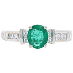 White Gold Emerald and Diamond Engagement Ring, 18 Karat Oval Cut 1.29 Carat