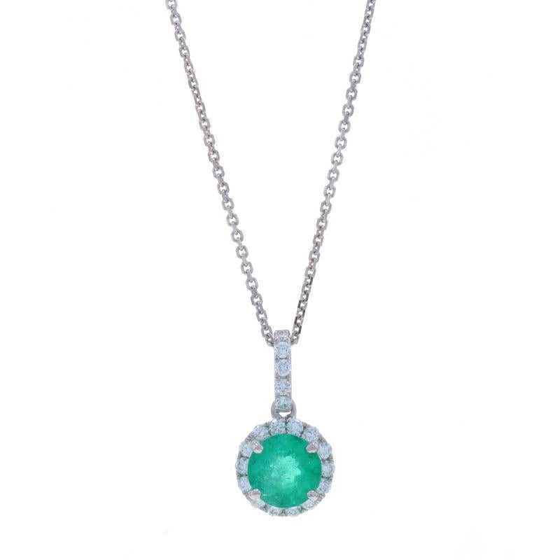 Metal Content: 14k White Gold

Stone Information

Natural Emerald
Treatment: Oiling
Carat(s): .91ct
Cut: Round
Color: Green
Origin: Zambian

Natural Diamonds
Carat(s): .25ctw
Cut: Round Brilliant
Color: G
Clarity: SI1

Total Carats: 1.16ctw

Style: