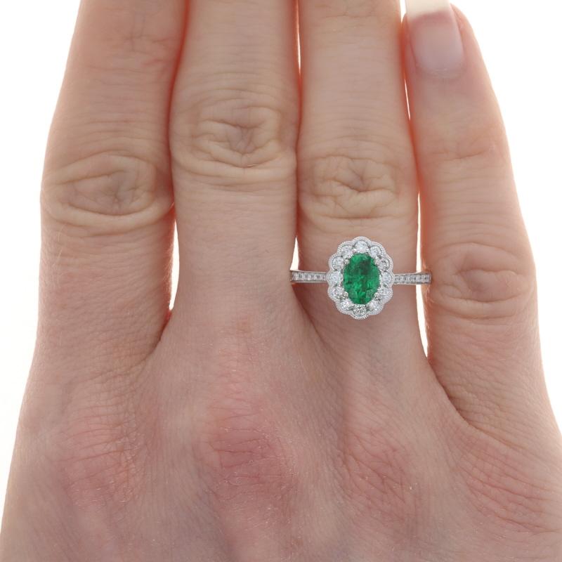 Size: 7
Sizing Fee: Up 2 sizes for $50

Metal Content: 14k White Gold

Stone Information
Natural Emerald
Treatment: Oiling
Carat(s): .57ct
Cut: Oval
Color: Green

Natural Diamonds
Carat(s): .35ctw
Cut: Round Brilliant
Color: G
Clarity: VS1 -