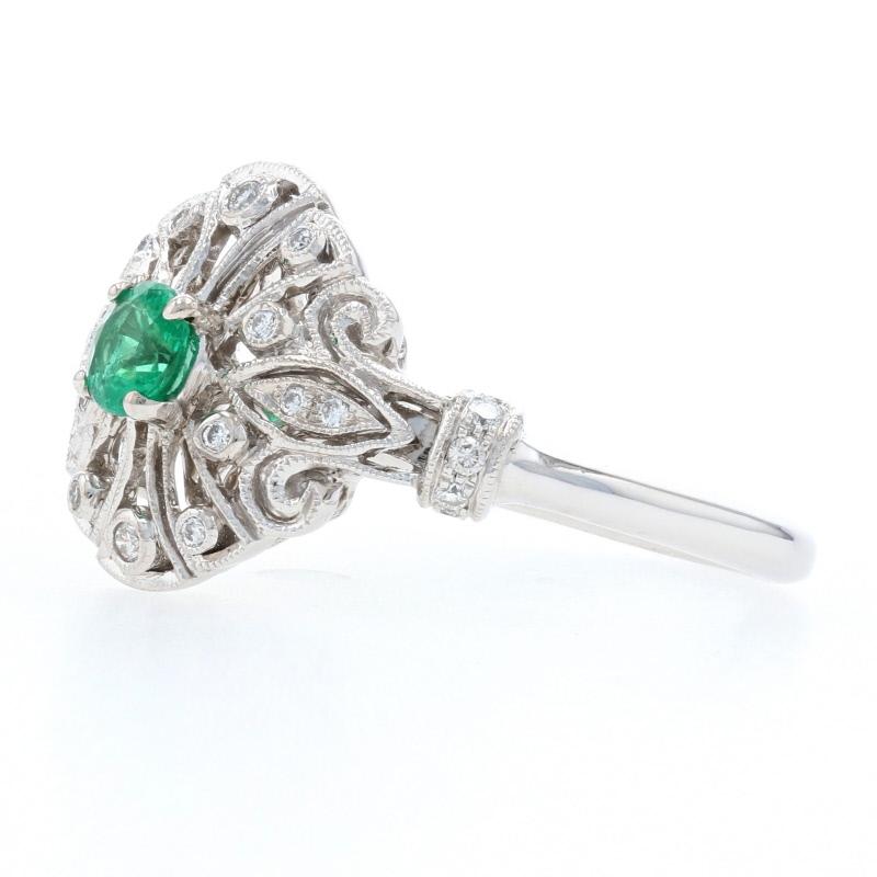 Size: 6 1/2 
Sizing Fee: Up 2 sizes or Down 1 size for $30 

Brand: Beverly K.

Metal Content: 14k White Gold 

Stone Information: 
Genuine Emerald
Treatment: Oiling
Carat: .20ct
Cut: Round 
Color: Green
Diameter: 4mm 

Natural Diamonds
Carats: