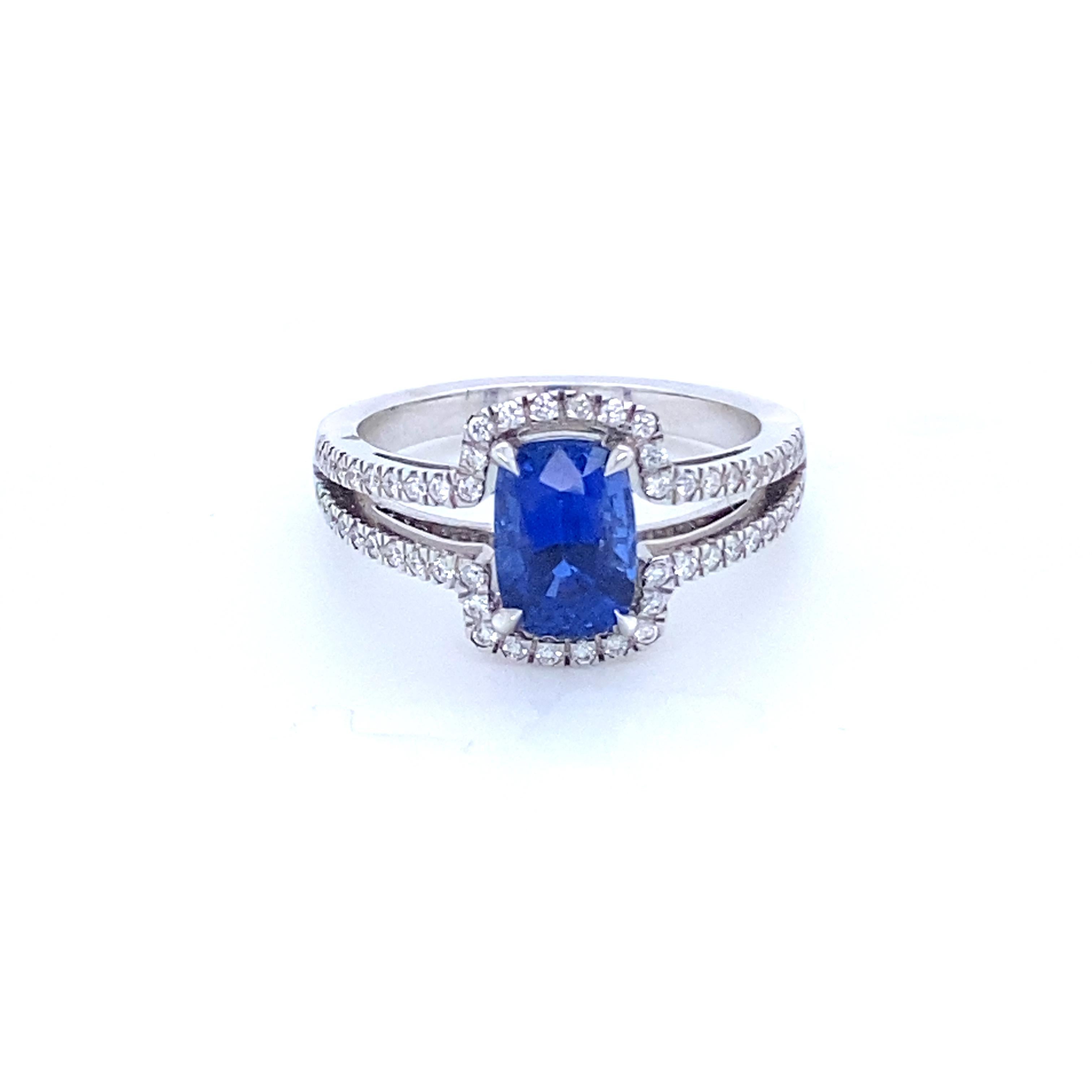 White Gold Engagement Ring with Ceylon Sapphire and 56 diamonds
French Collection by Mesure et Art du Temps.

Engagement ring in 18 carat white gold. The ring is surmounted by a Cushion-shaped Ceylon sapphire which weighs 1.76 Carat, this ring is
