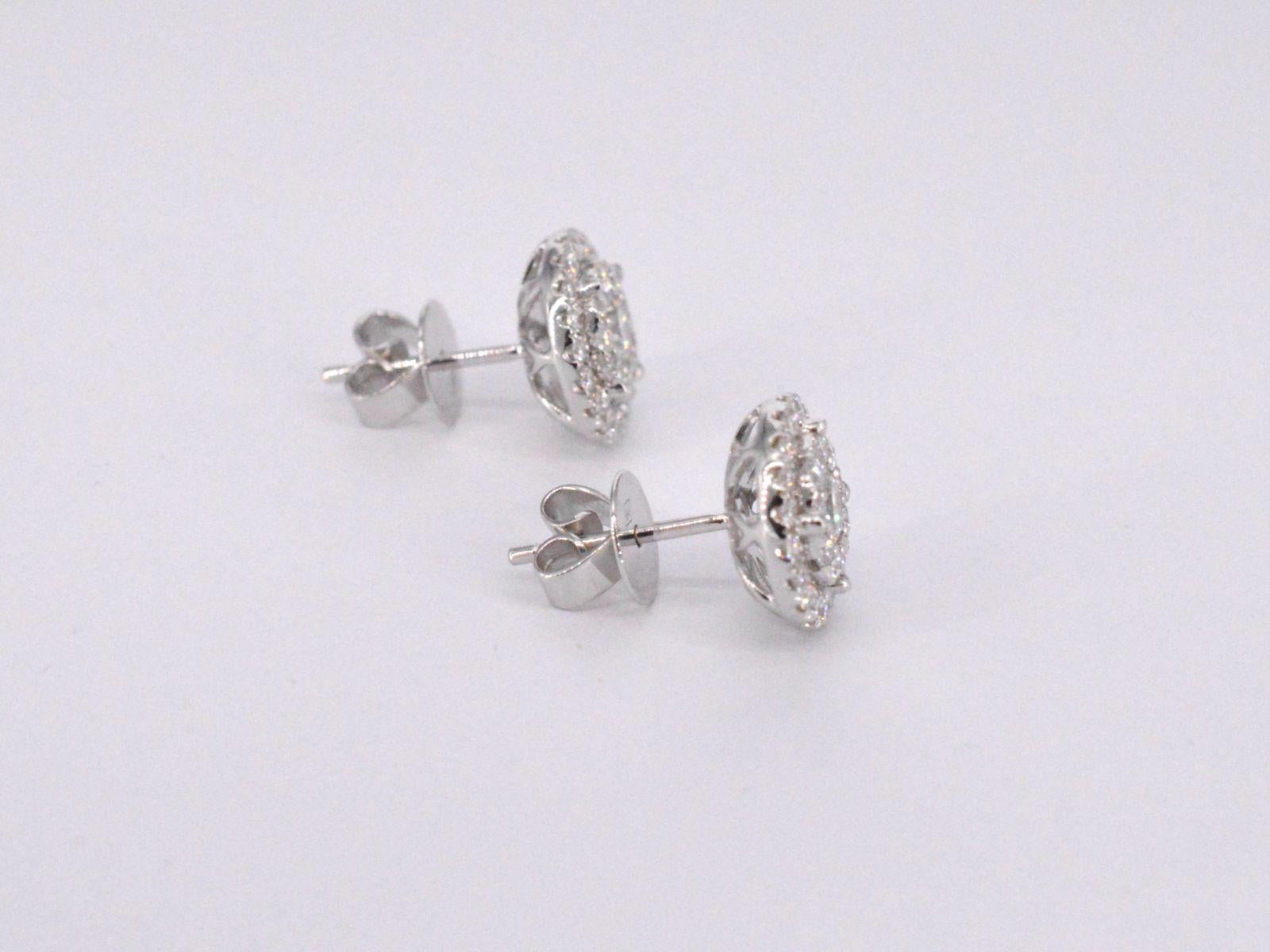White gold entourage earrings set with 60 brilliant cut diamonds For Sale 1