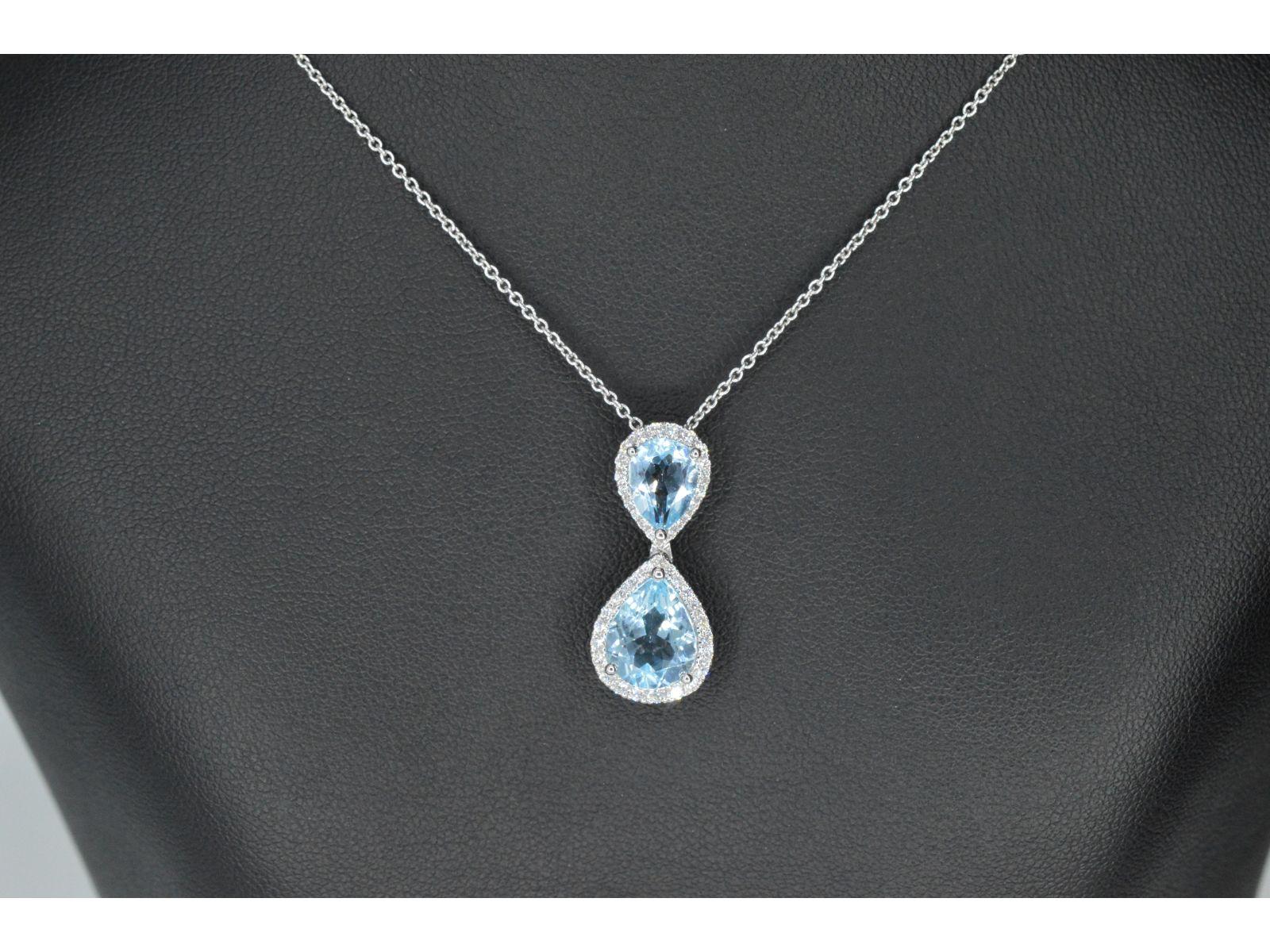 Diamonds: Naturally shiny; Weight: 0.50 carat; Cut: Brilliant; Colour: F-G; Purity: 
VS; Grinding quality: Very good; Gemstones: Topaz; Weight: 3.50 / 2.00 carat; Grinding shape: Drop/pear shape; Color: Swiss Blue; Jewel: Pendant (excl. Necklace);