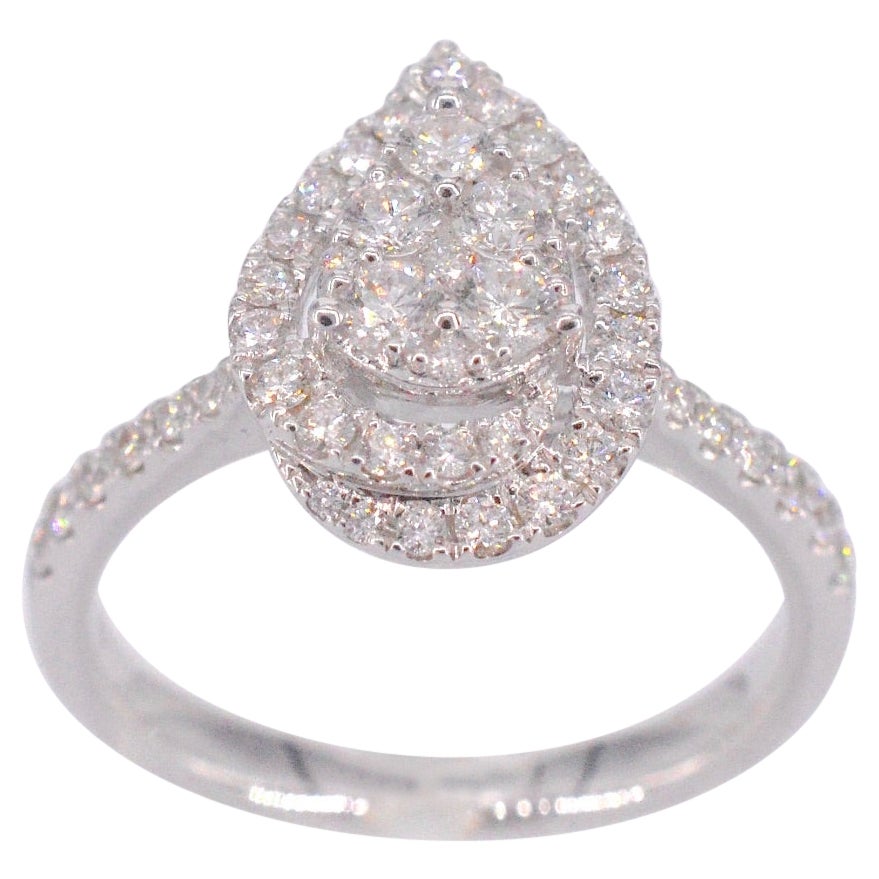 Bague d'entourage en or blanc avec diamant en forme de poire