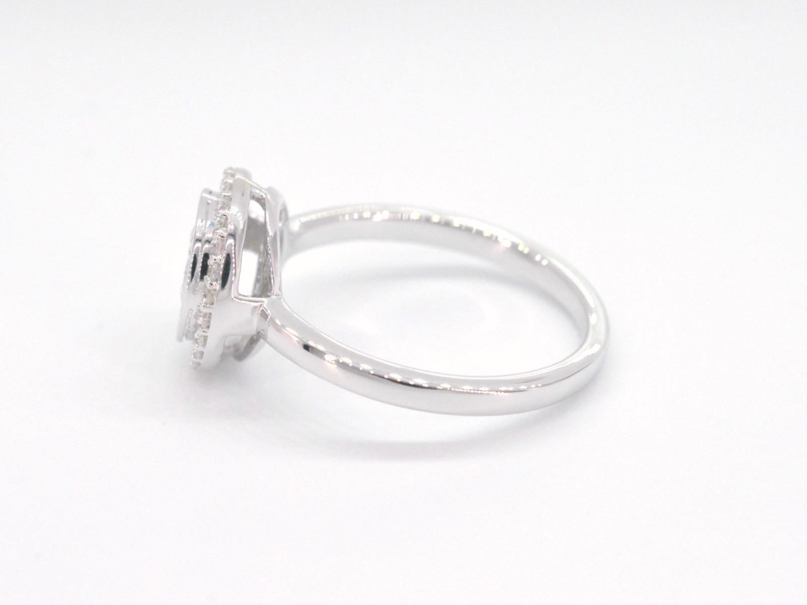 Brilliant Cut White Gold Entourage Ring with Brilliant and Baguette Cut Diamonds For Sale