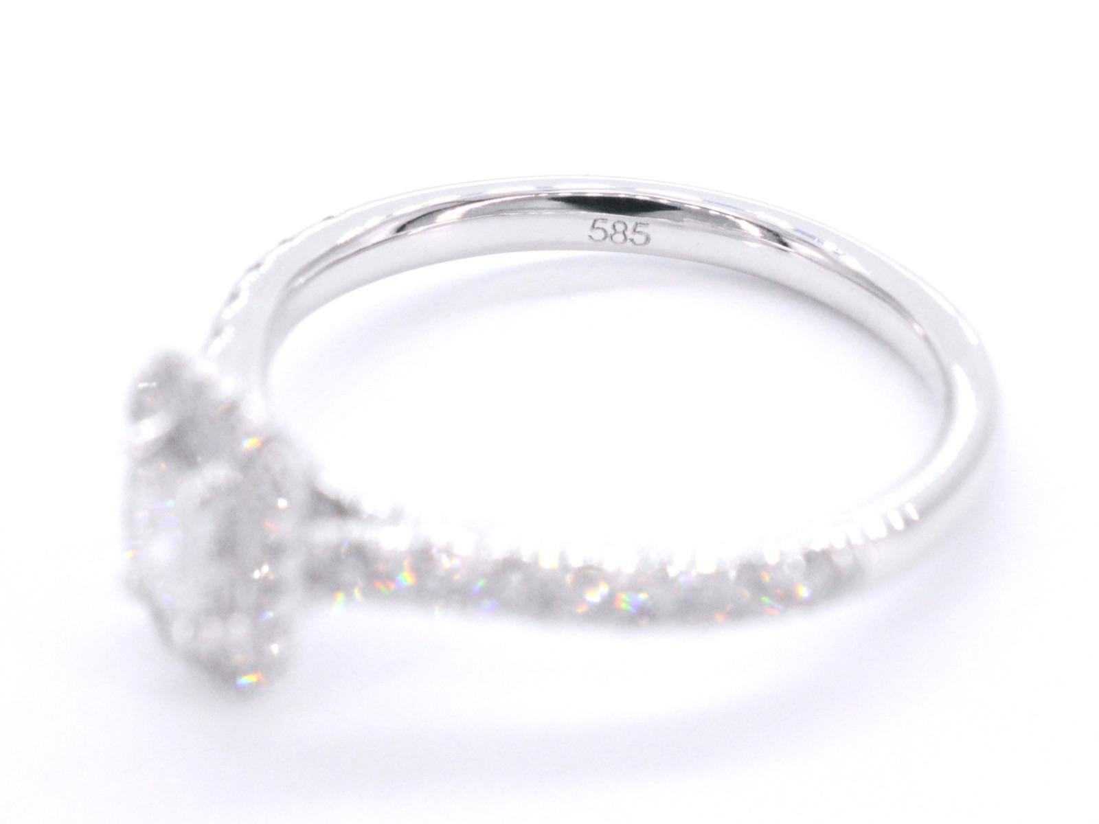 Brilliant Cut White Gold Entourage Ring with Brilliant and Baguette Cut Diamonds For Sale