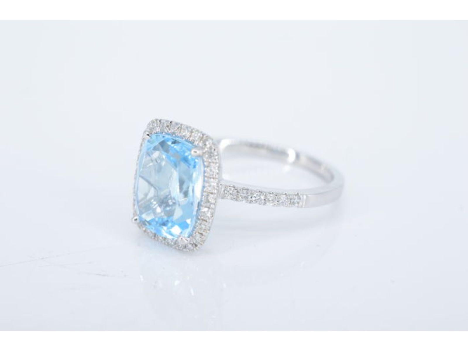 Brilliant Cut White Gold Entourage Ring with Cushion-Cut Topaz For Sale
