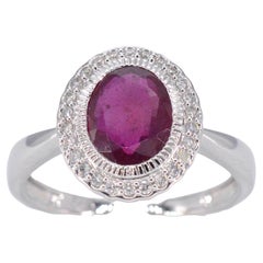 White gold entourage ring with diamonds and ruby