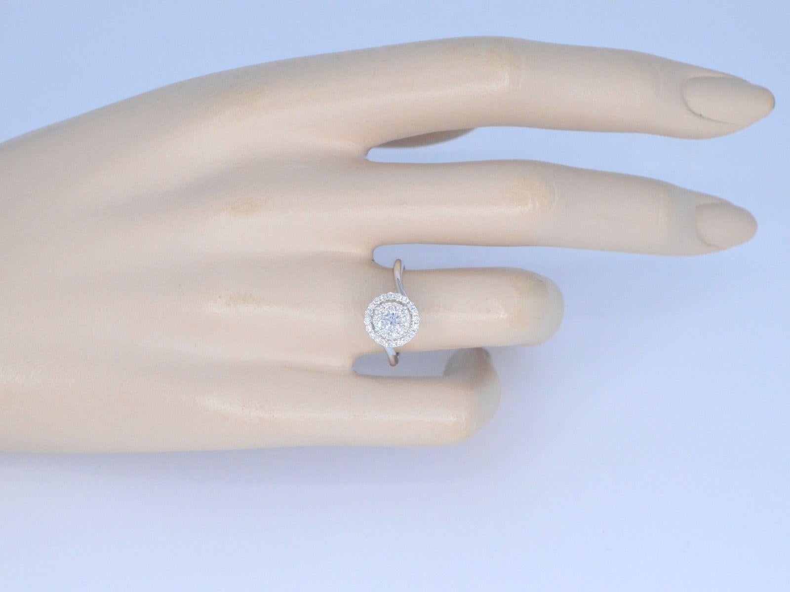 Contemporary White Gold Entourage Ring with Diamonds For Sale