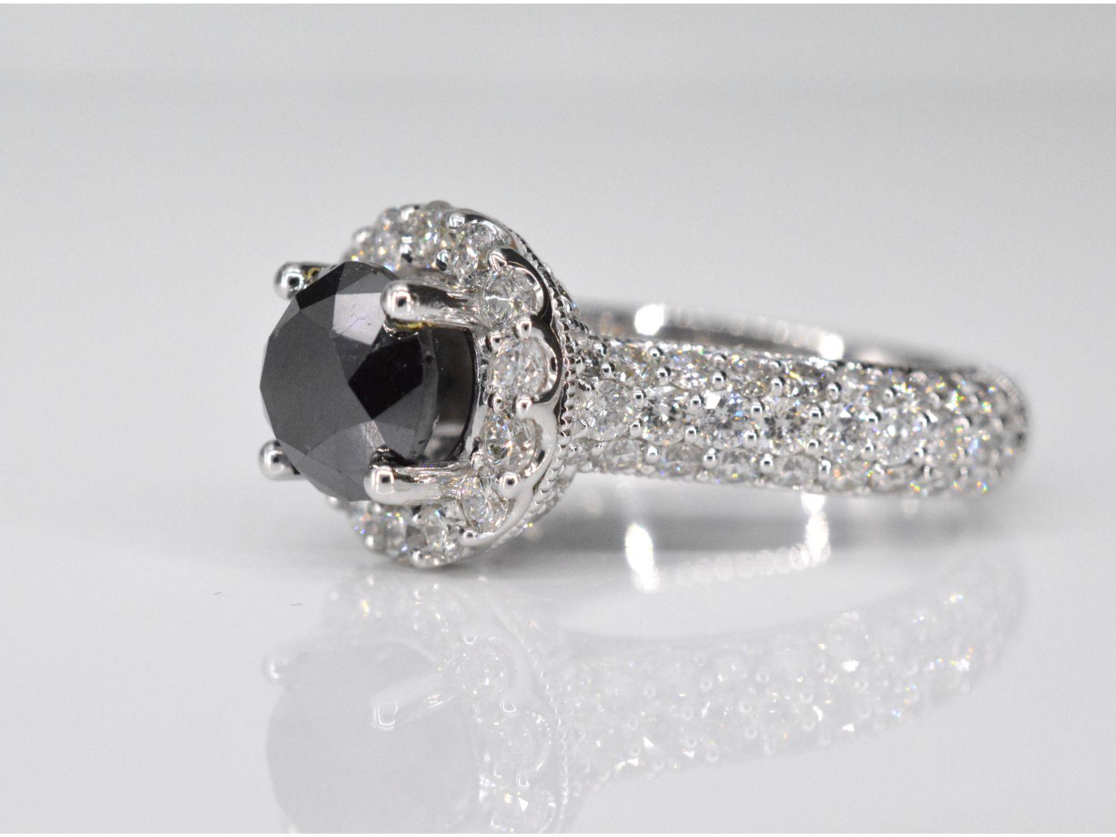 Brilliant Cut White gold entourage ring with large diamonds and a black diamond For Sale