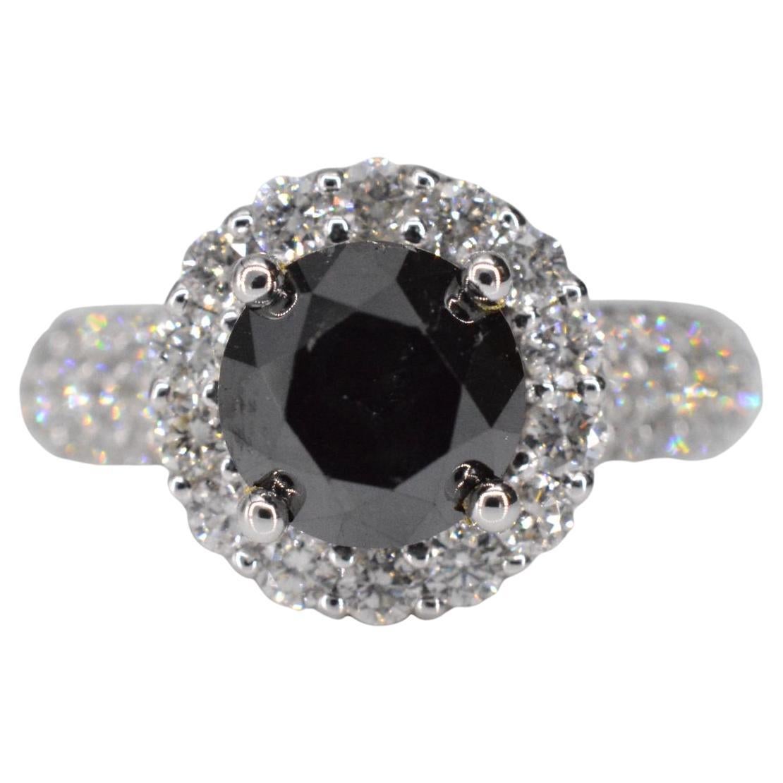 White gold entourage ring with large diamonds and a black diamond For Sale