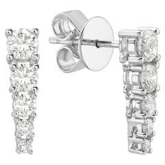 Boucles d'oreilles pendantes en or blanc à cinq pierres