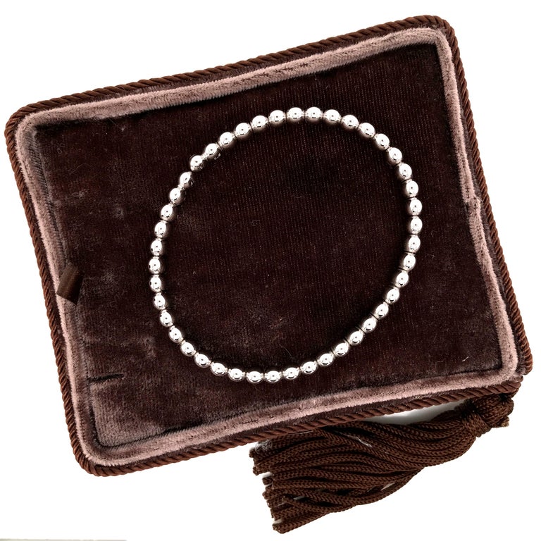 White Gold Flexible Bracelet 18 K Grain of Rice shape
Weight Gold 9.50 
Worn alone or overlapped for a personal mix & match game, Stretch Spring jewels define a minimalist and decisively, featuring refined details to complete an everyday