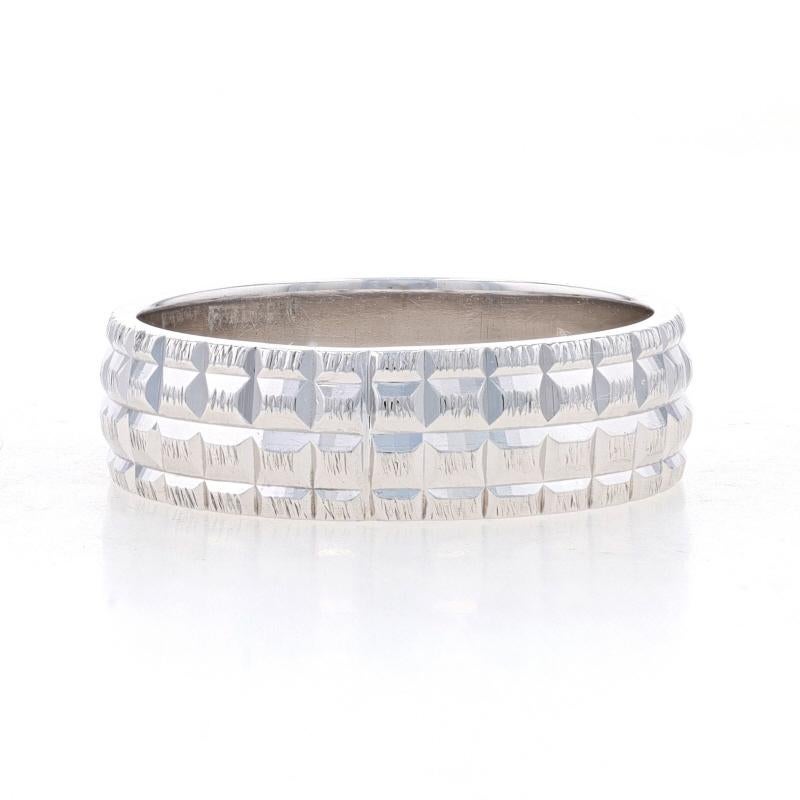 Size: 8 1/4

Metal Content: 14k White Gold

Style: Wedding Band without Stones
Theme: Geometric Grid
Features: Smoothly finished interior with etched exterior detailing spanning the band's entire perimeter

Measurements

Face Height (north to